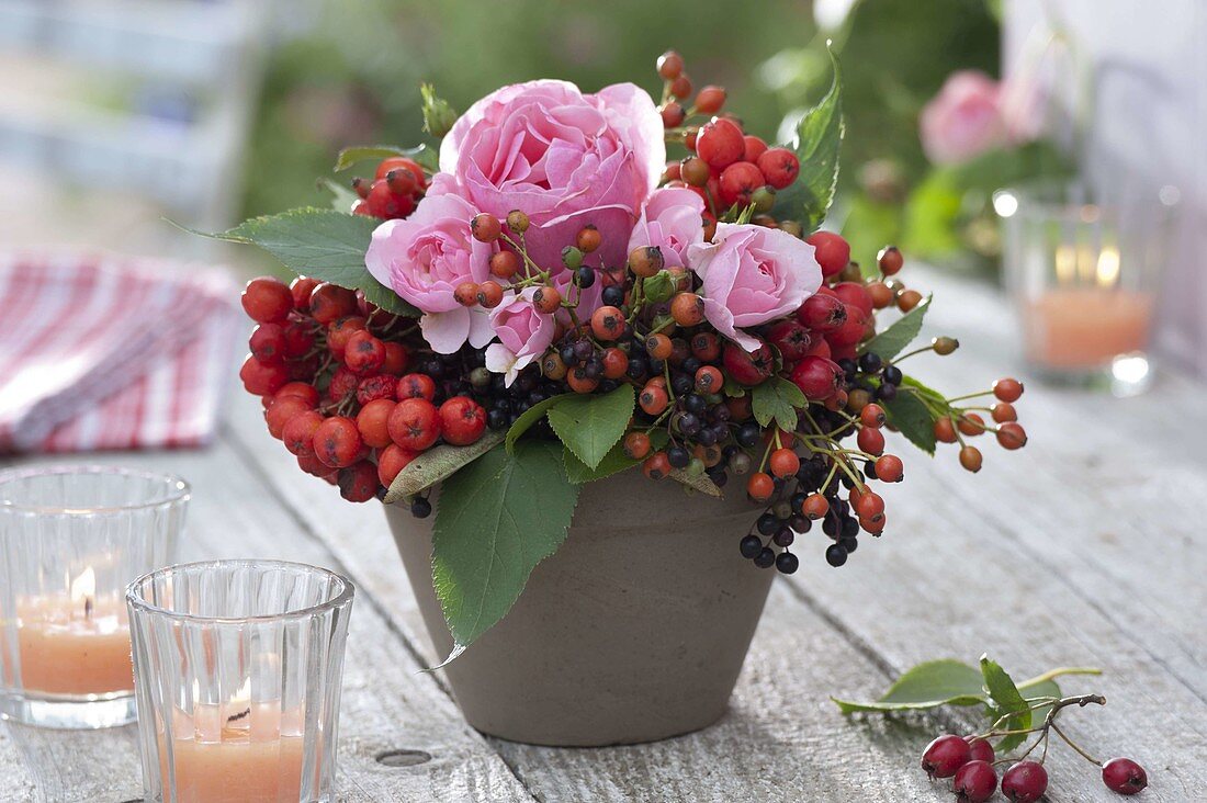 Small bouquet of pink (rose and rosehips), elderberries