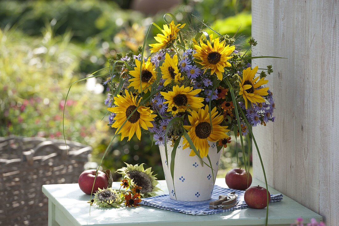 Autumn bouquet with Helianthus (sunflowers), Aster (autumn asters)