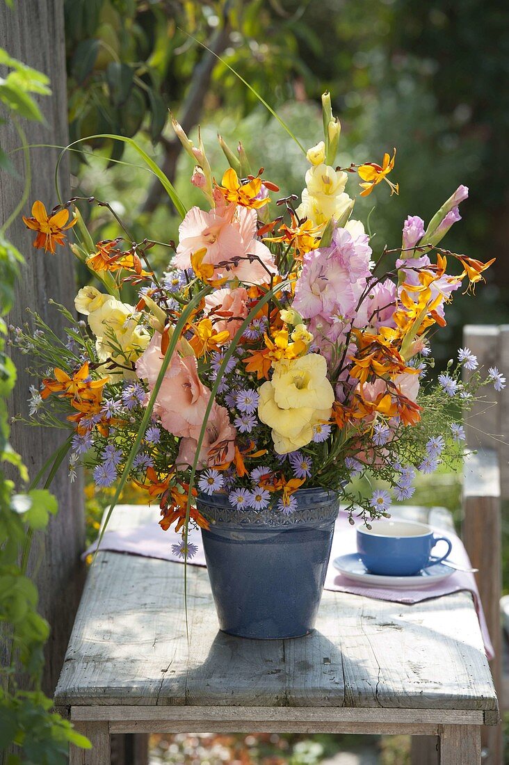 Late summer bouquet with gladiolus, Crocosmia 'Emily Mckenzie'