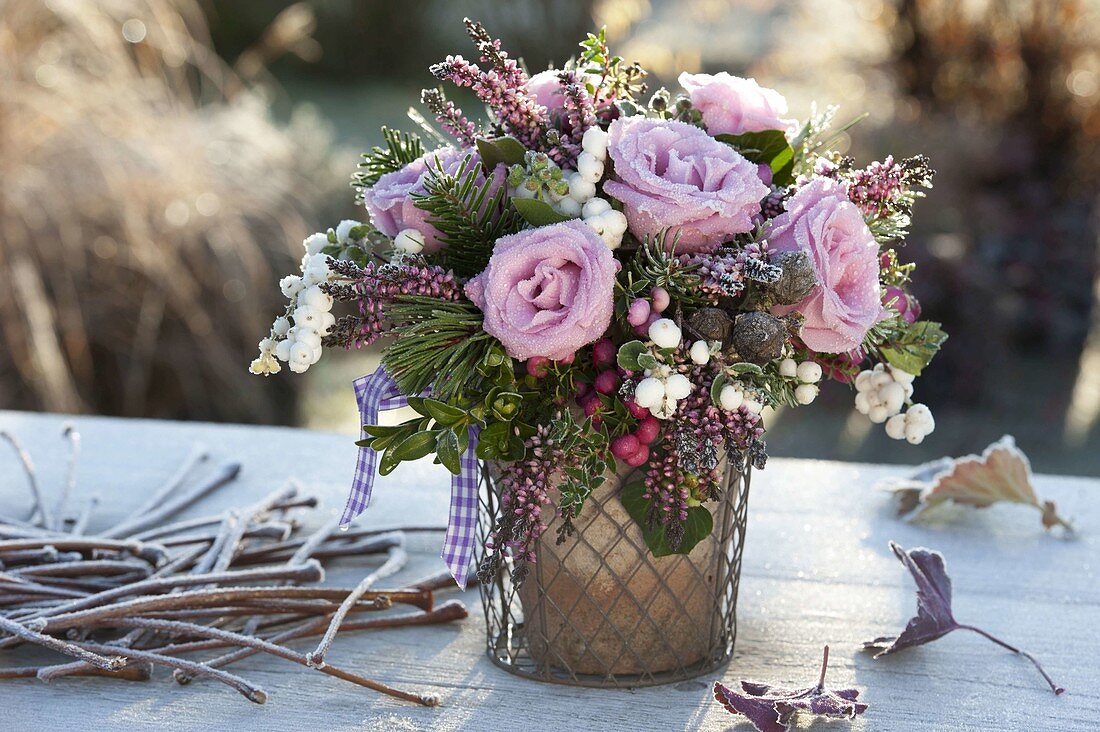 Frozen autumn bouquet with Rosa (roses), Calluna (broom heather)