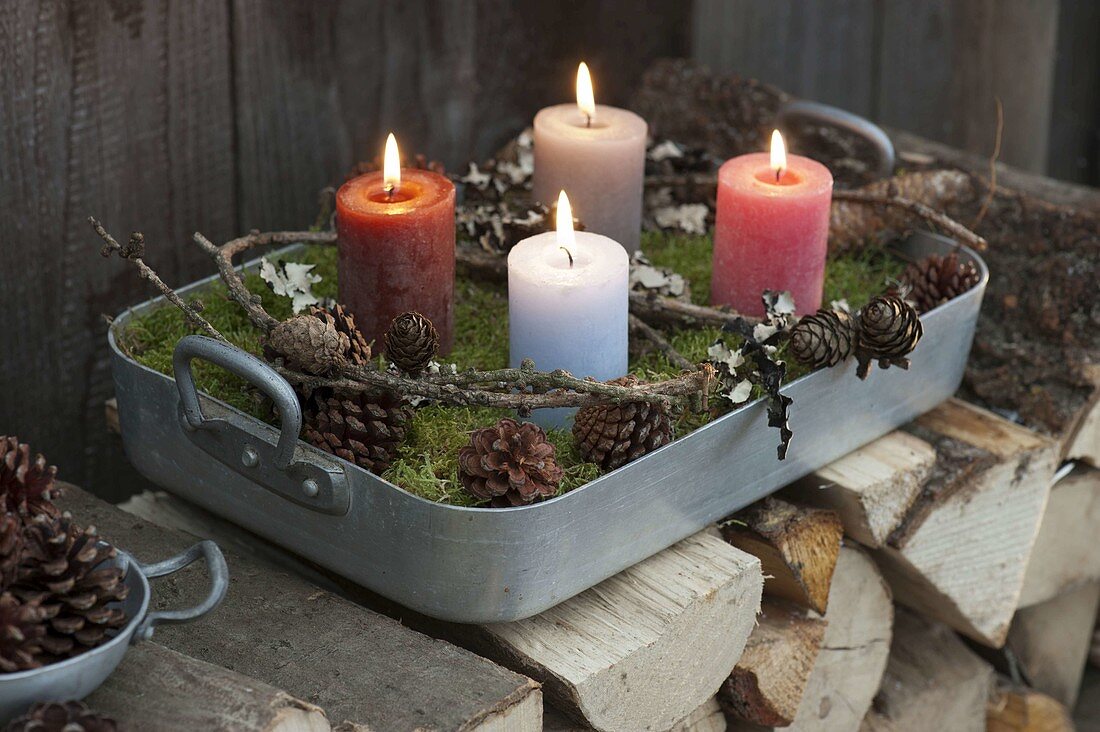 Natural Advent wreath with moss, twigs, cones and lichen