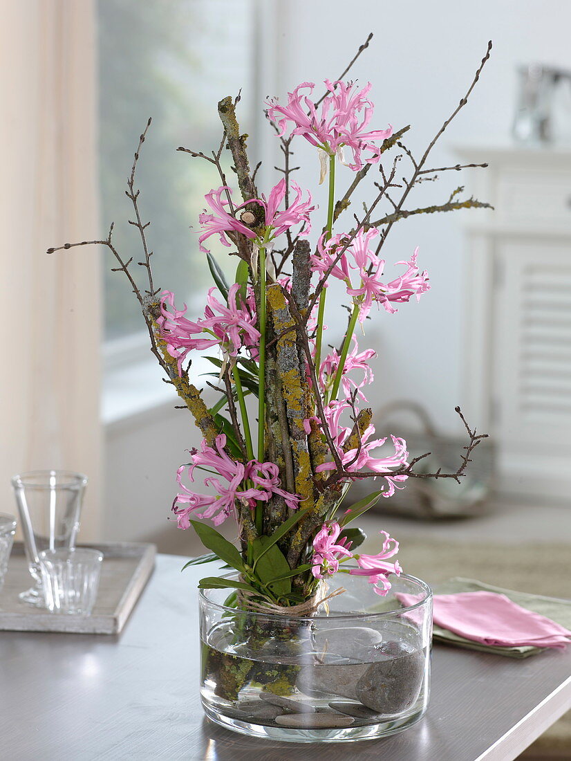 Modern standing bouquet with Nerine 'Ras van Roon' syn. 'Hot Pink'.
