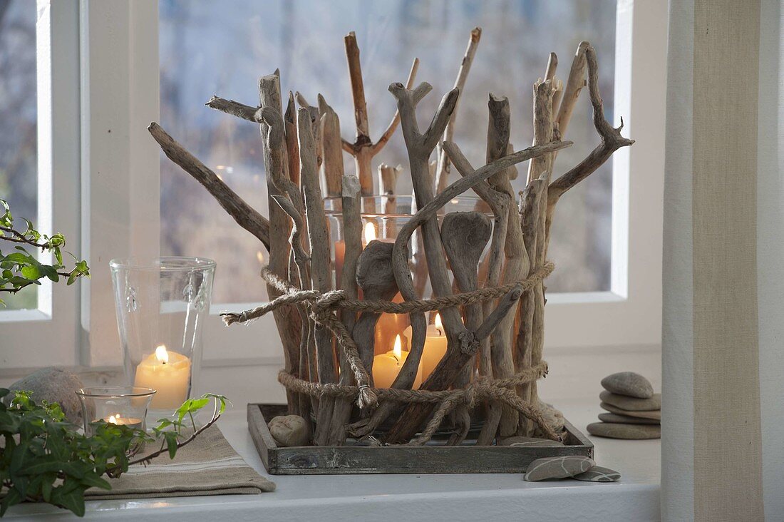 Large glasses with driftwood disguised as lanterns