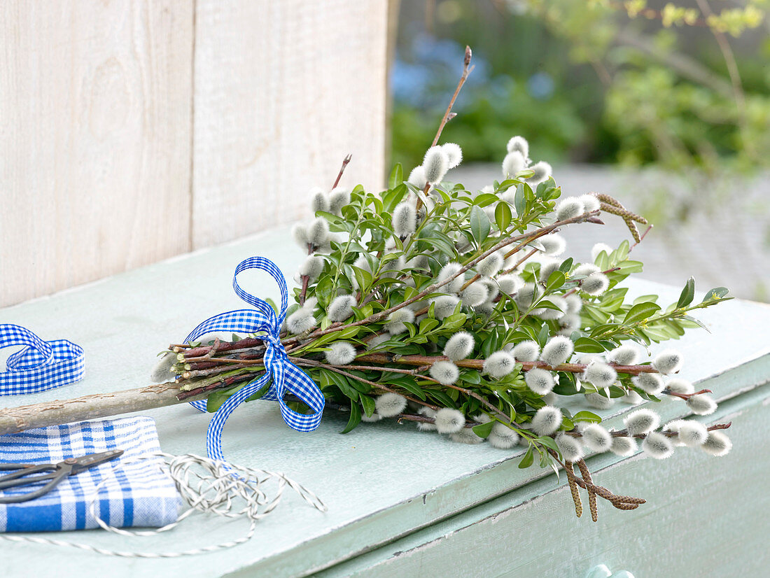 Bound palm bouquet made from branches of Salix (catkin willow)