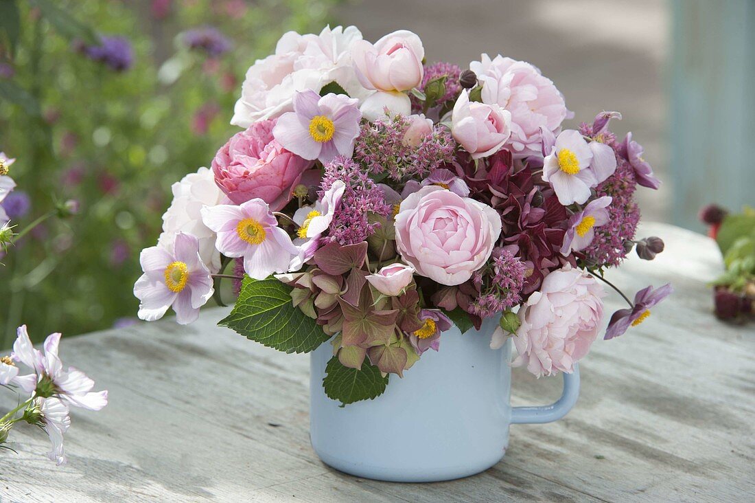 Early autumn bouquet of pink (roses), Anemone hupehensis