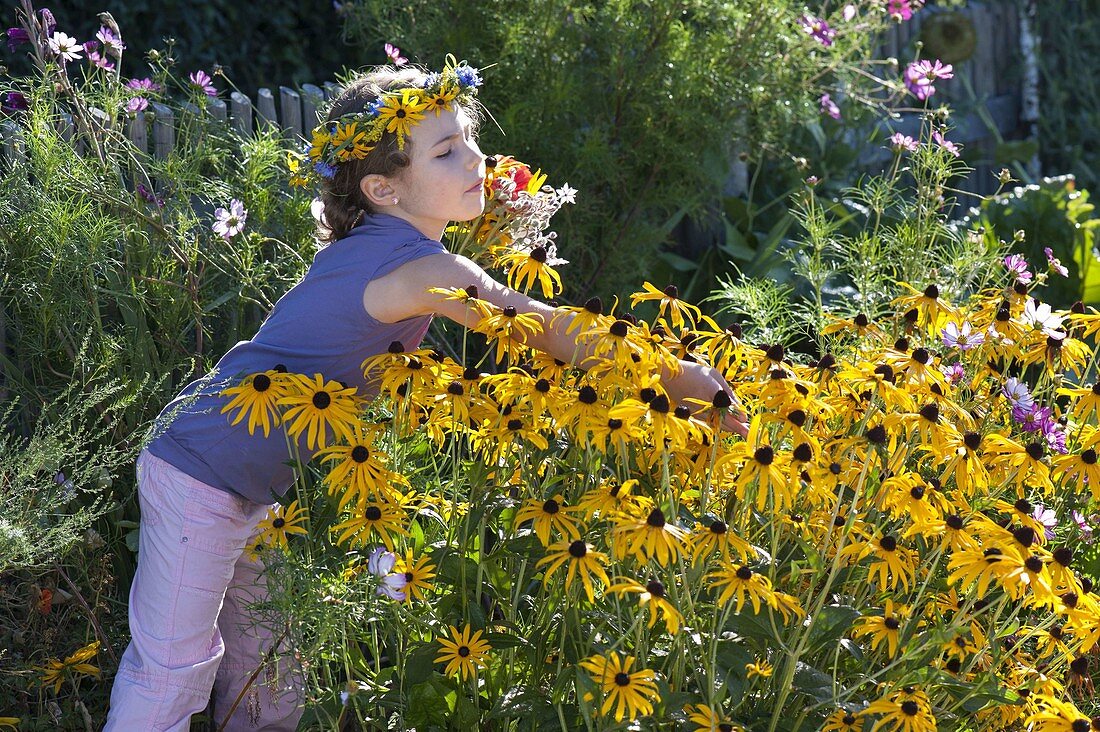 Children picking coneflowers