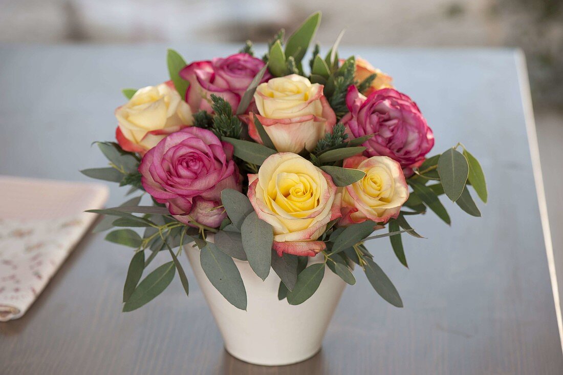 Winter bouquet with Rosa (roses), Eucalyptus and Juniperus (juniper)