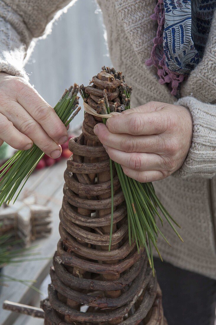 Cone made of grapevines to decorate a Christmas tree