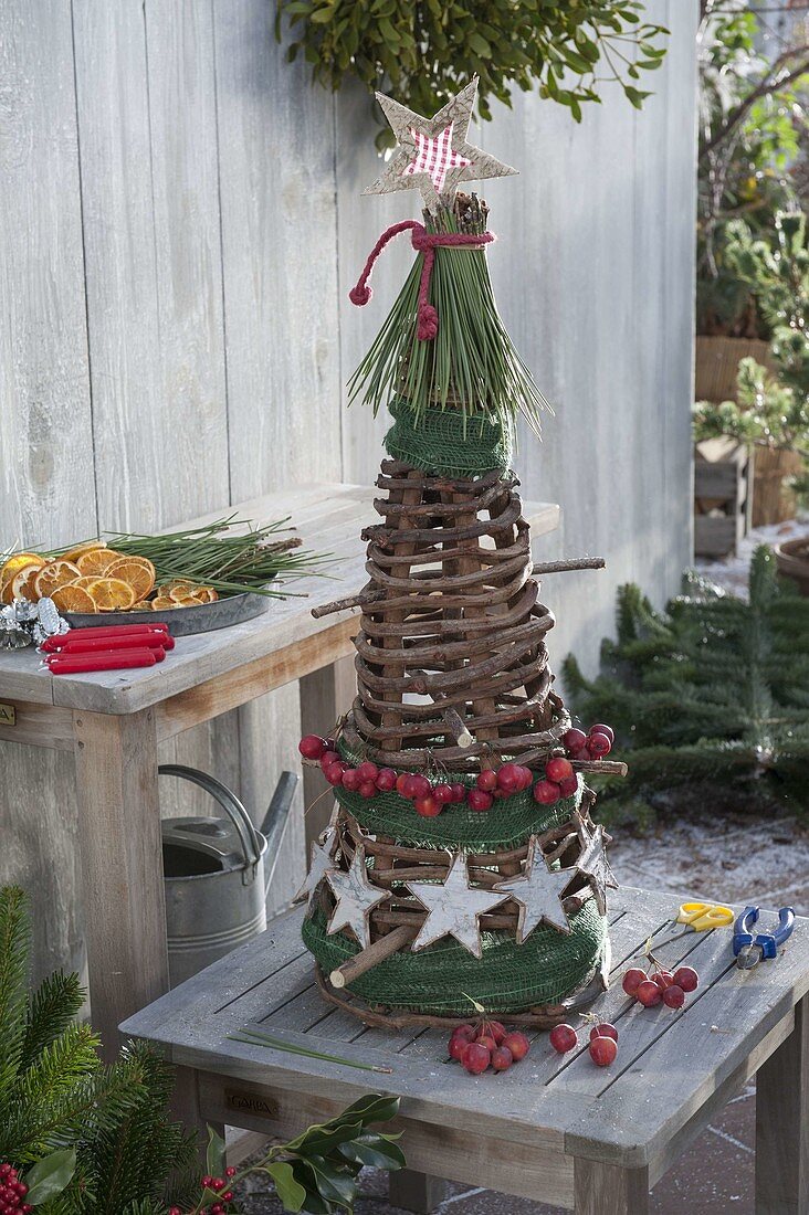 Cone made of grapevines to decorate a Christmas tree