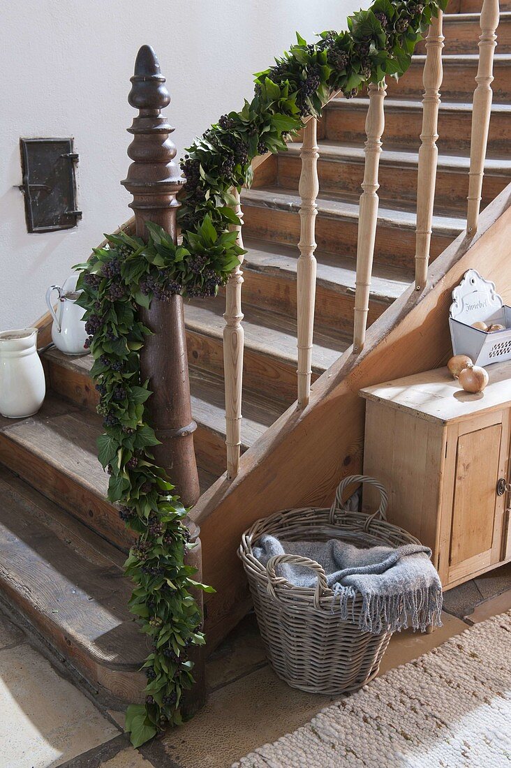 Tying an ivy garland