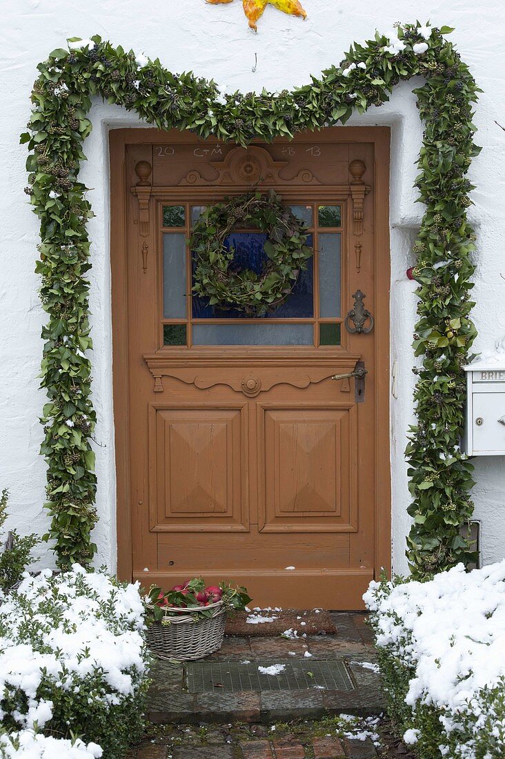 Tying an ivy garland