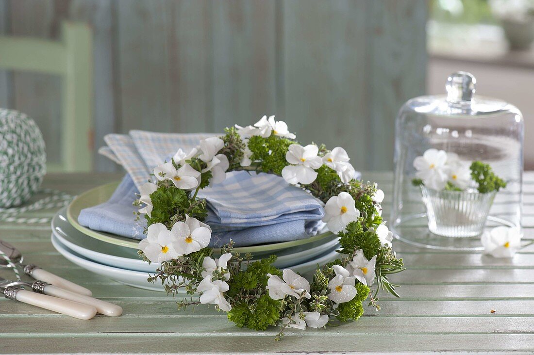 Small mixed wreath of viola cornuta (horned violet), parsley