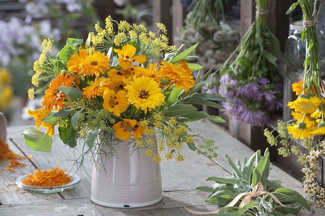 Yellow bouquet of edible flowers and herbs