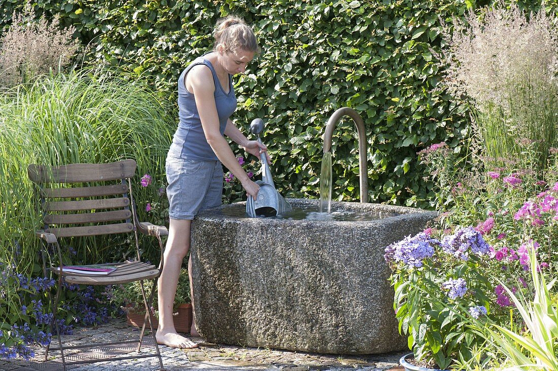 Fountain with natural stone trough