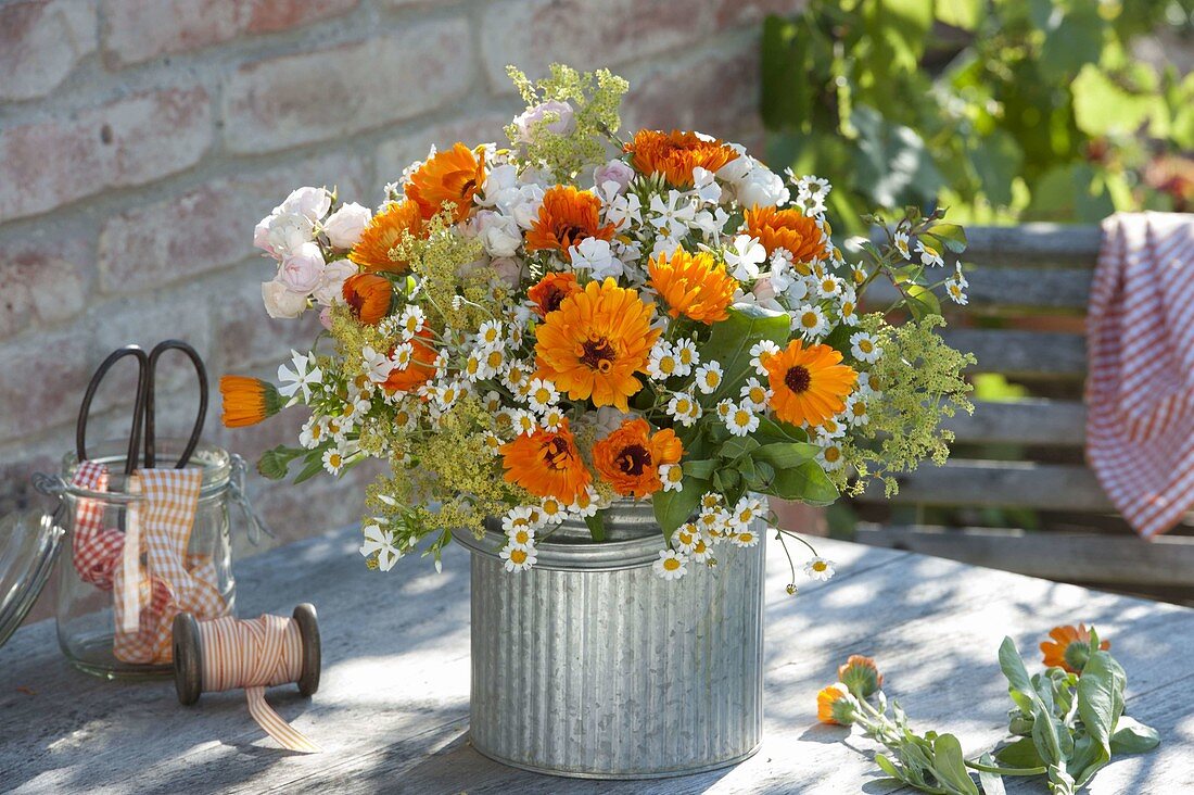 Bouquet of Calendula (marigolds), Tanacetum parthenium (motherwort)