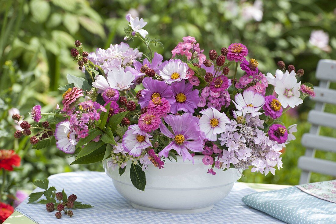 White and pink bouquet of cosmos (ornamental basket), zinnia (zinnias)