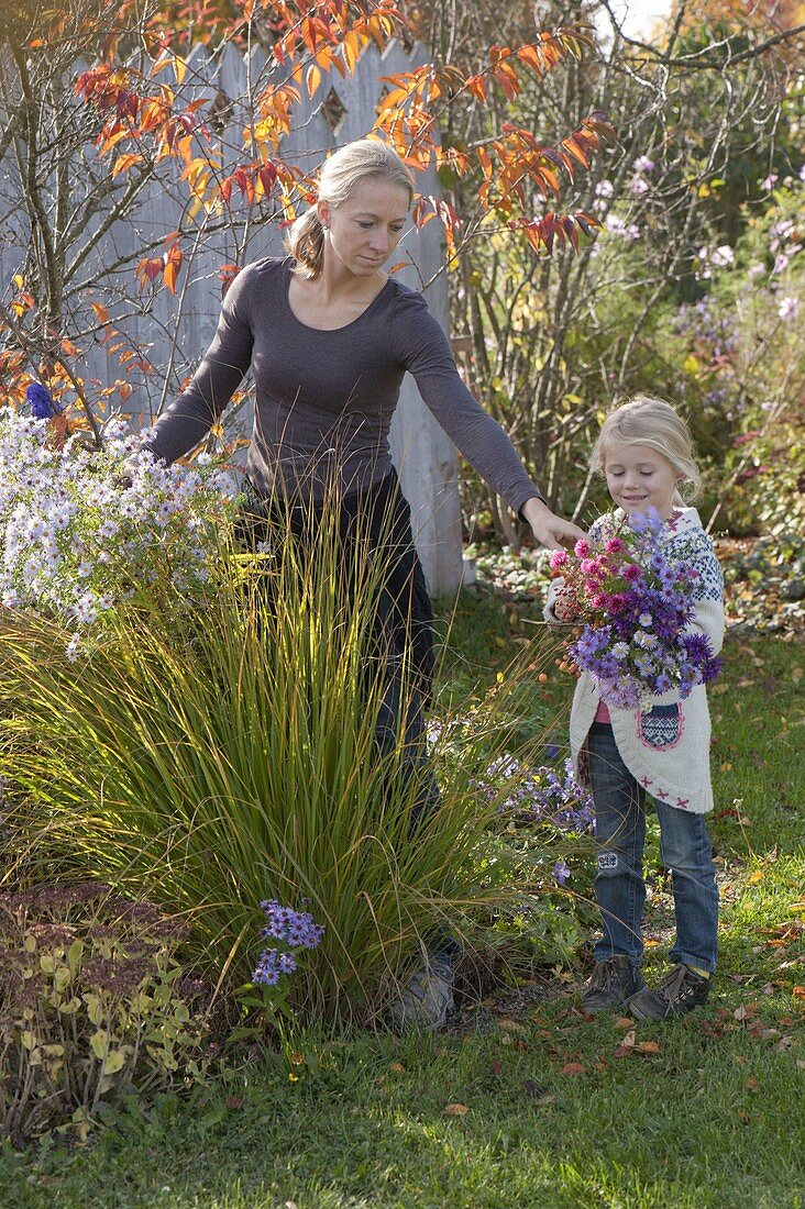 Woman picking the last flowers for a bouquet