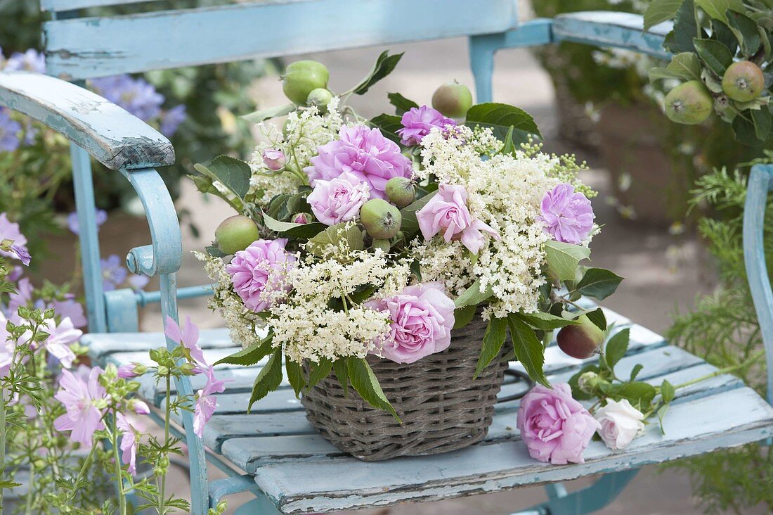 Fragrant arrangement in the basket, pink (rose), flowers of elderberry