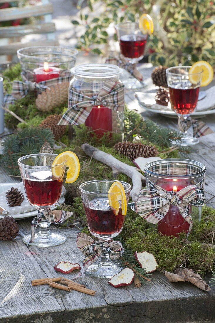 Forest table decoration with moss and cones