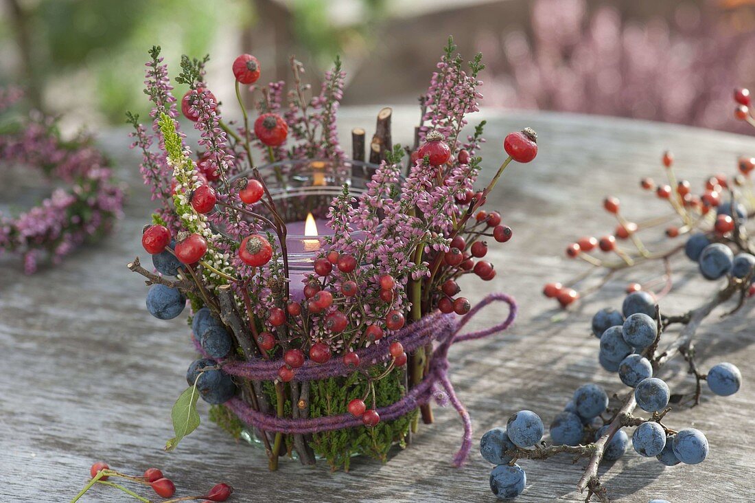 Autumn lantern with Calluna (broom heather), Rosa (rose hips) and blackthorn