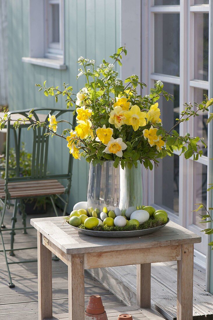 Easter bouquet from Narcissus, branches of Carpinus