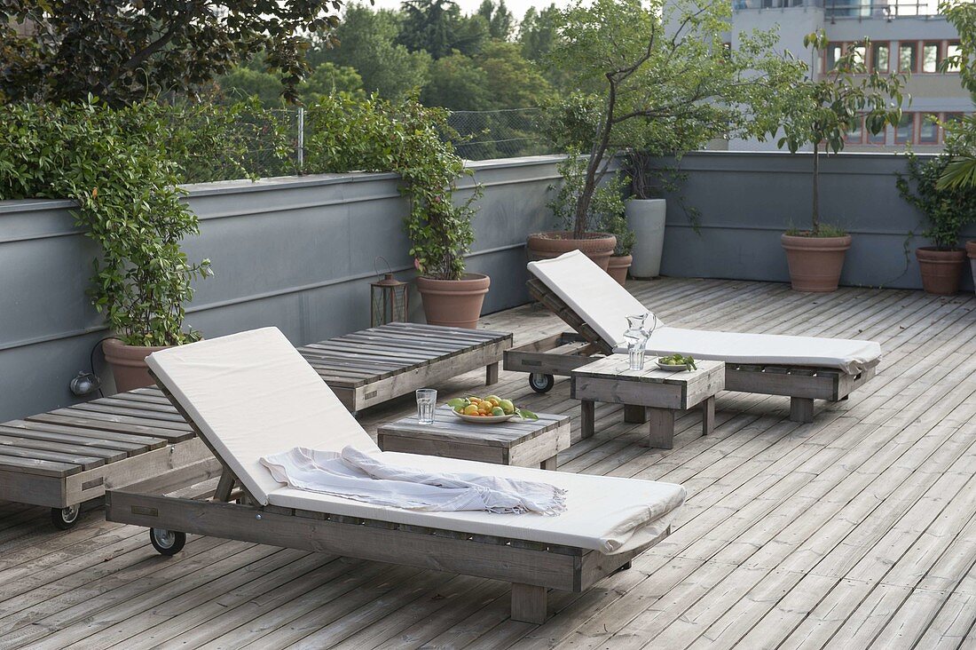 Mediterranean roof terrace with wooden deck
