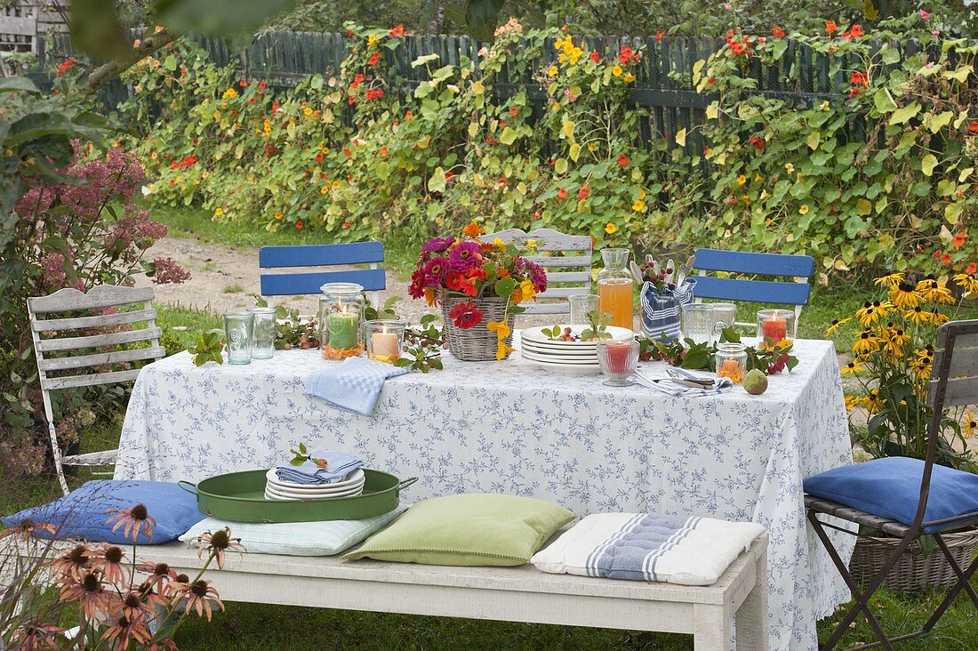 Laid table in autumnal garden