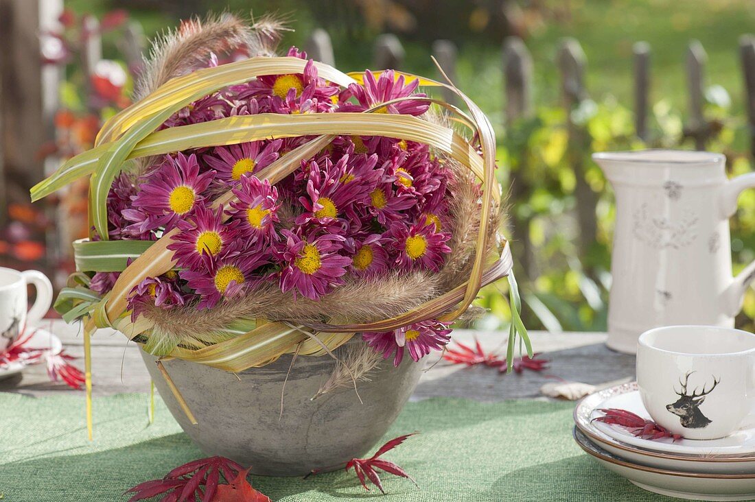 Arrangement of chrysanthemum (autumn chrysanthemum) with miscanthus