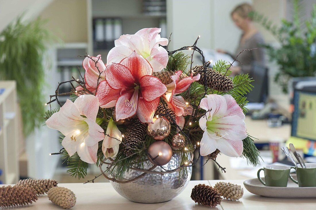 Christmas bouquet with fairy lights in the office