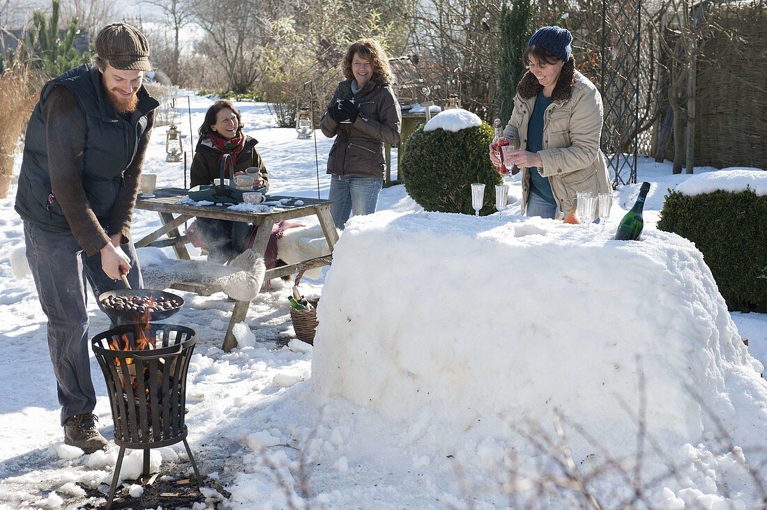 Snow bar in the winter snowy garden