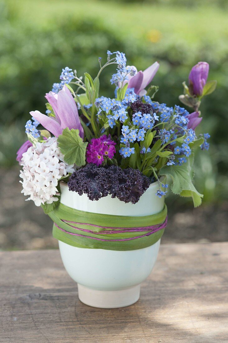 Magnolia bouquet (magnolia), myosotis (forget-me-not)