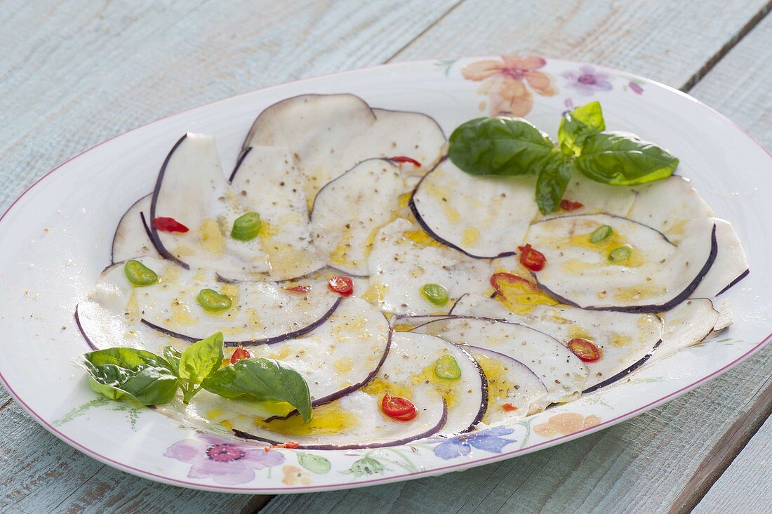 Carpaccio of aubergines with basil and chilli peppers