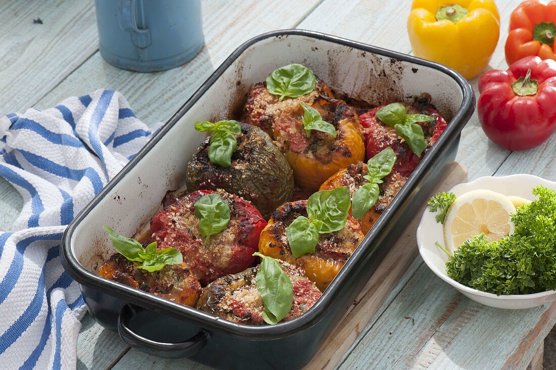 Stuffed peppers from the oven, decorated with basil