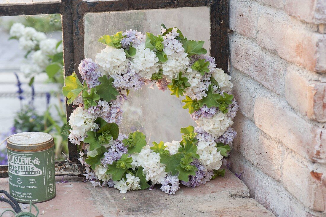 Fragrant wreath of syringa, viburnum and alchemilla