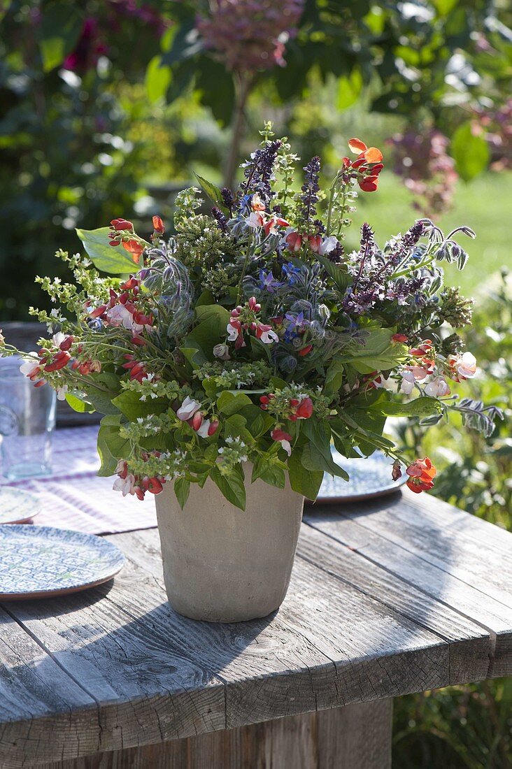 Bouquet of bean flowers and herbs