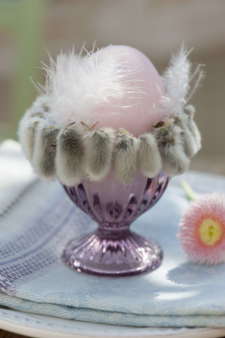 Pink breakfast egg in eggcup with catkins sleeve