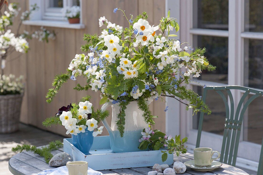 Spring bouquet of Narcissus (narcissus), Larix (larch), Malus