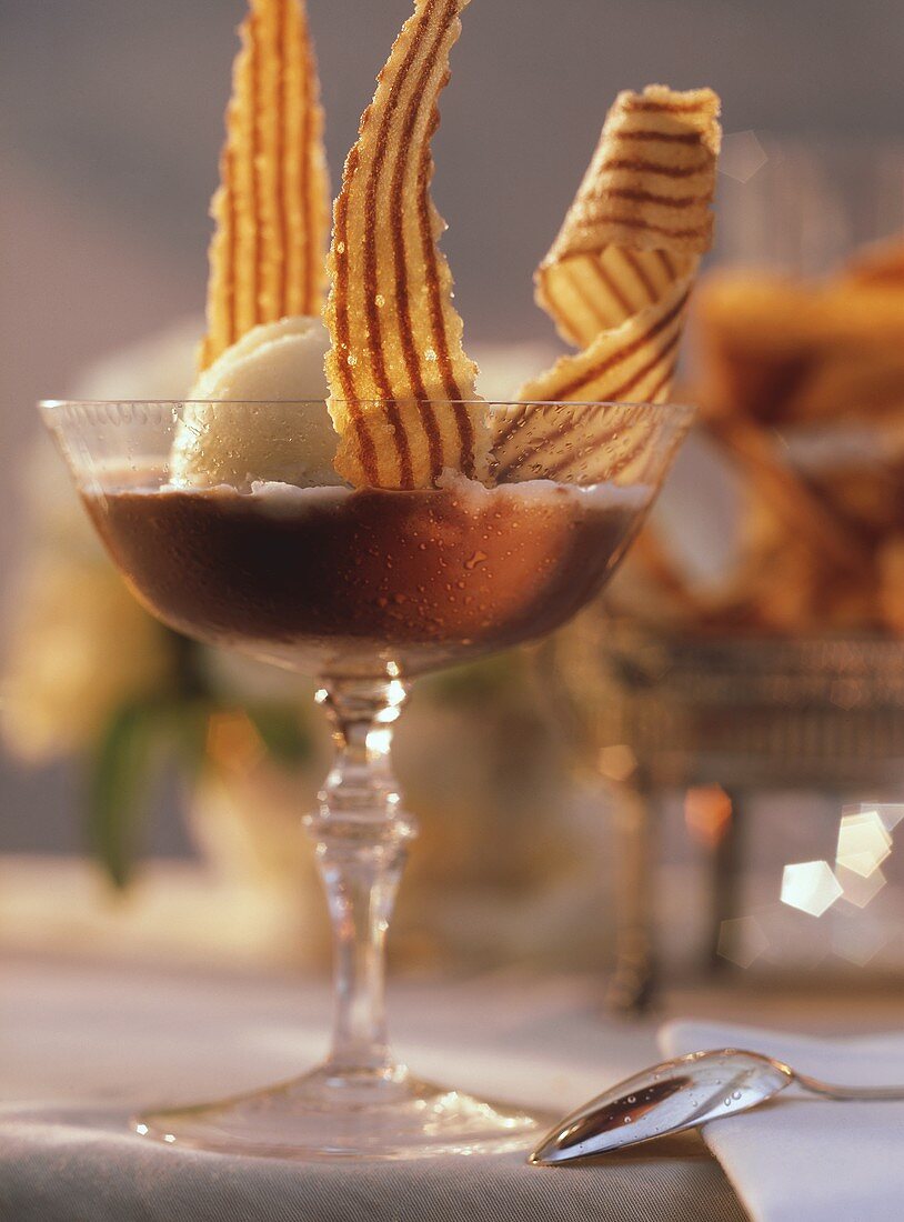 Frozen chocolate soup with ginger sorbet in sundae glass