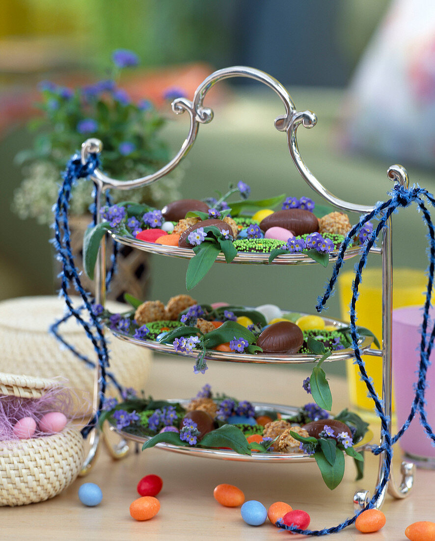 Etagere of silver with eggs and blossoms