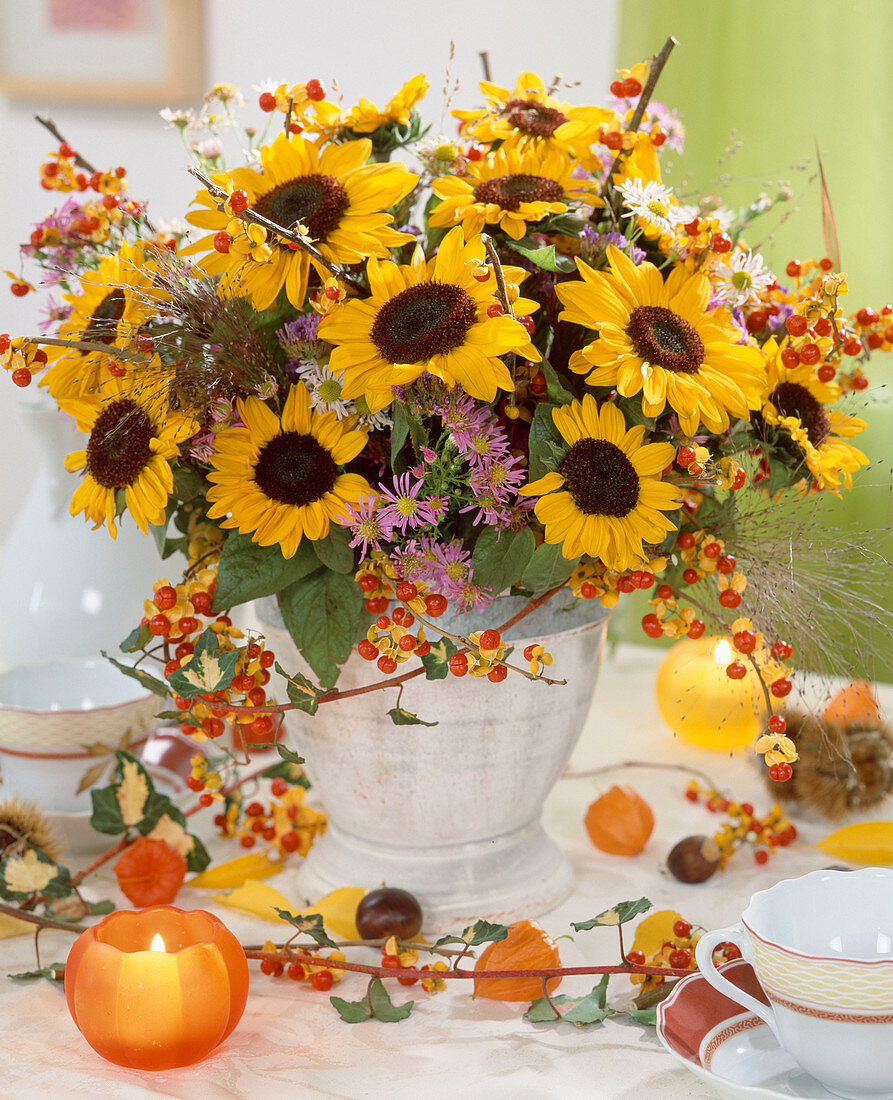 Autumn bouquet with Helianthus, Celastrus