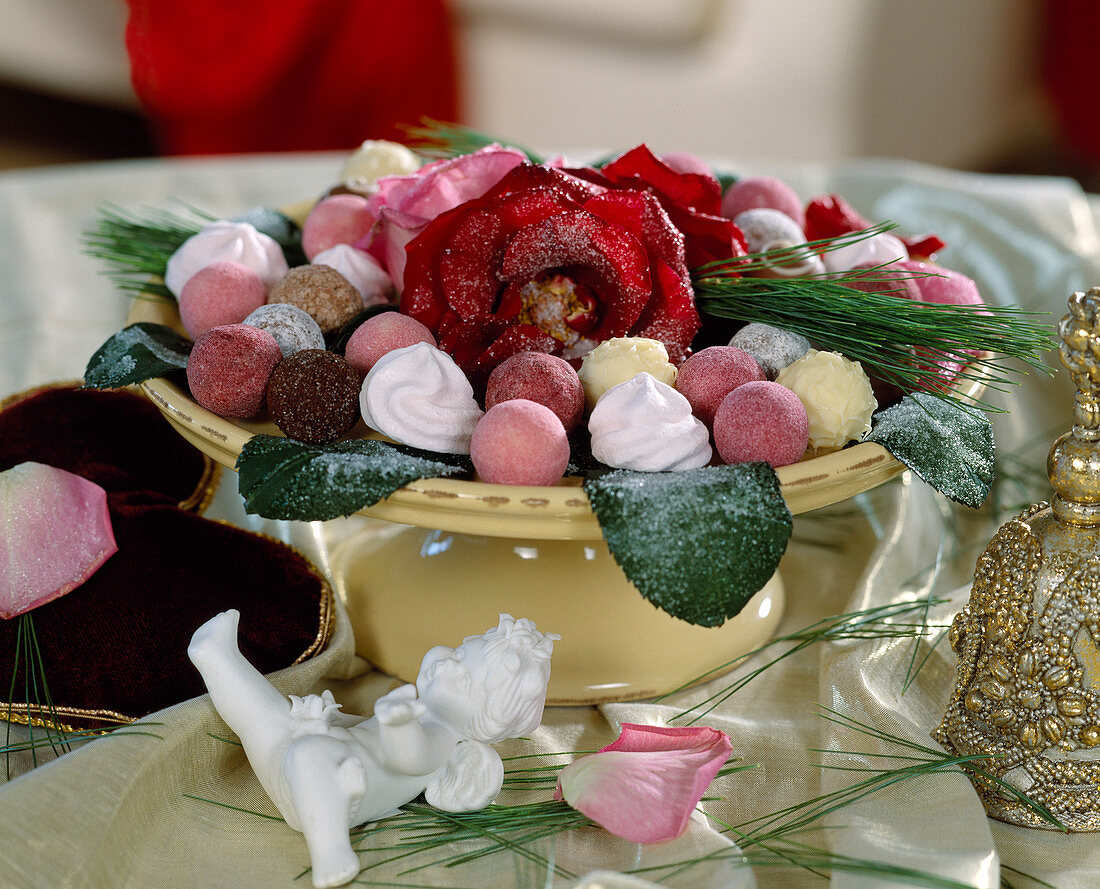 Bowl with sugared rose petals and leaf pralines