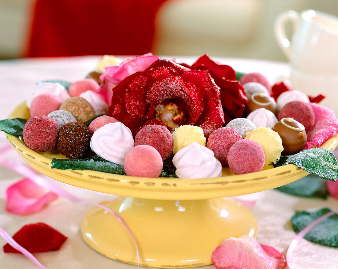 Bowl with chocolates and sugared roses