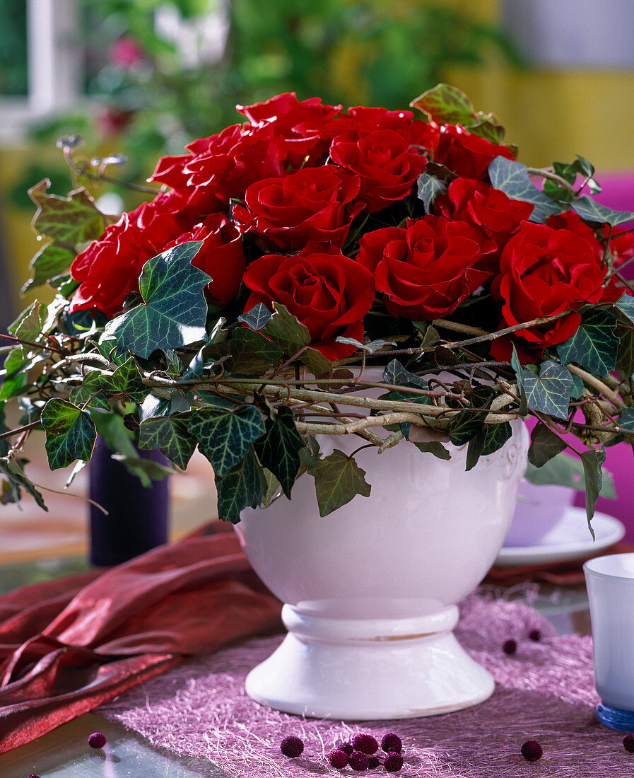 Red roses (Grand Prix) and wreath of Hedera helix (ivy)