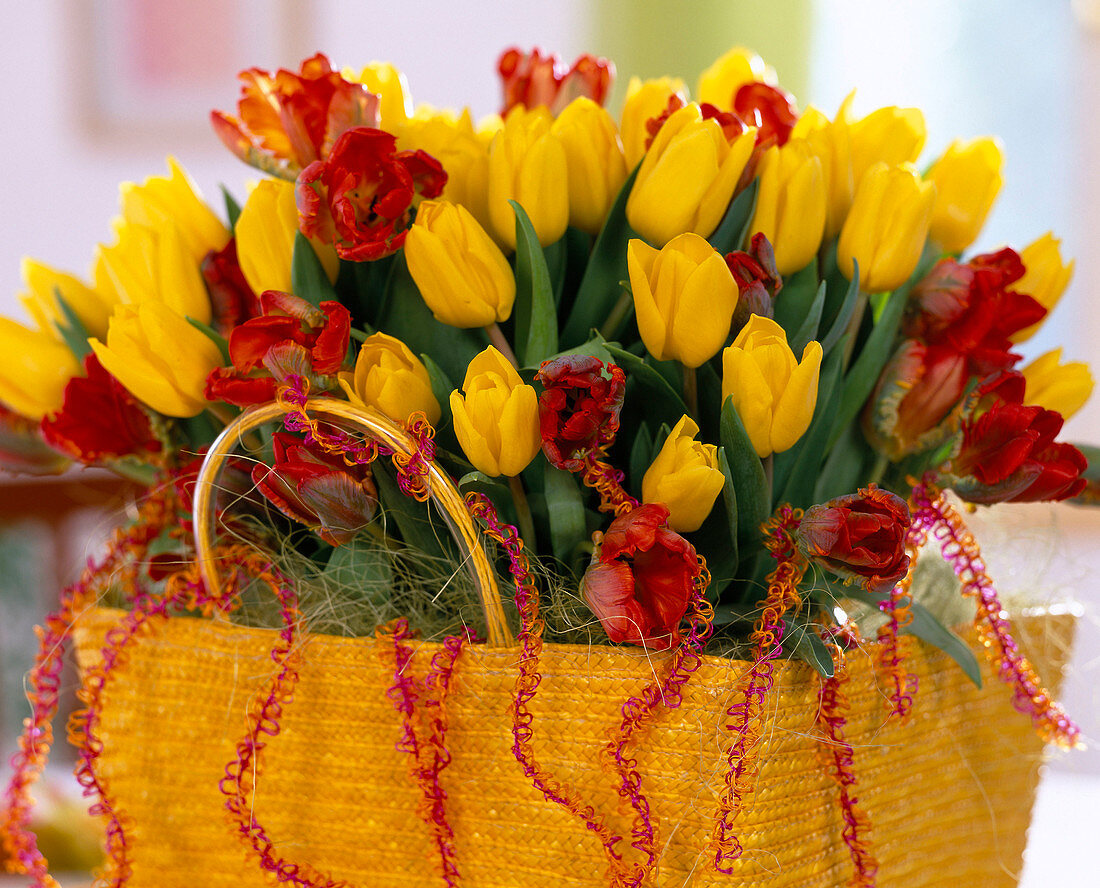 Bouquet of tulips in raffia bag