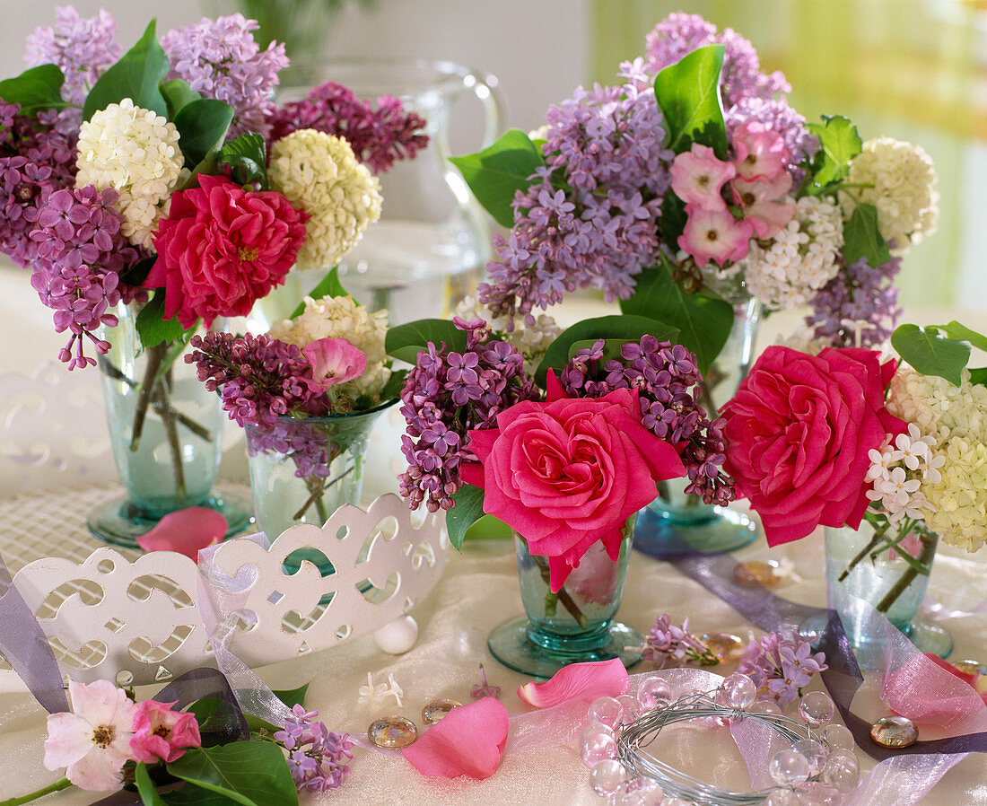 Scented arrangement with pink (rose petals), Syringa vulgaris