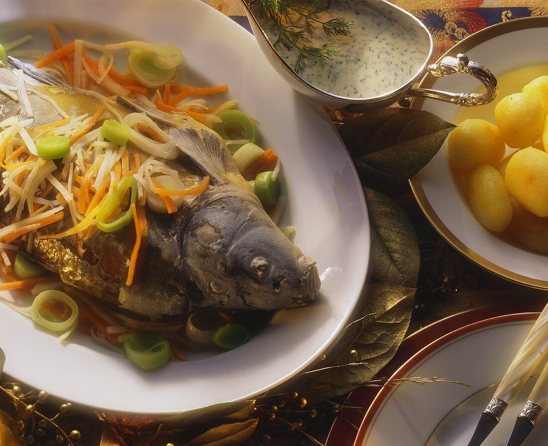 Carp cooked blue with celery and carrots & dill sauce