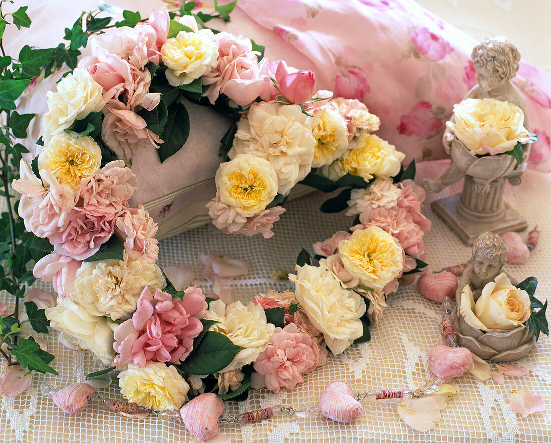 Heart-shaped wreath of various rose petals