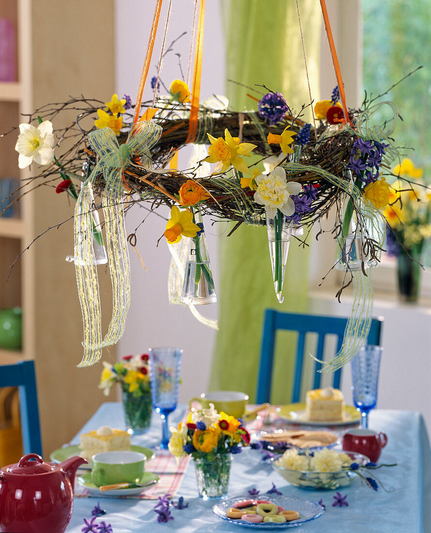 Wreath of twigs hung from the ceiling, decorated