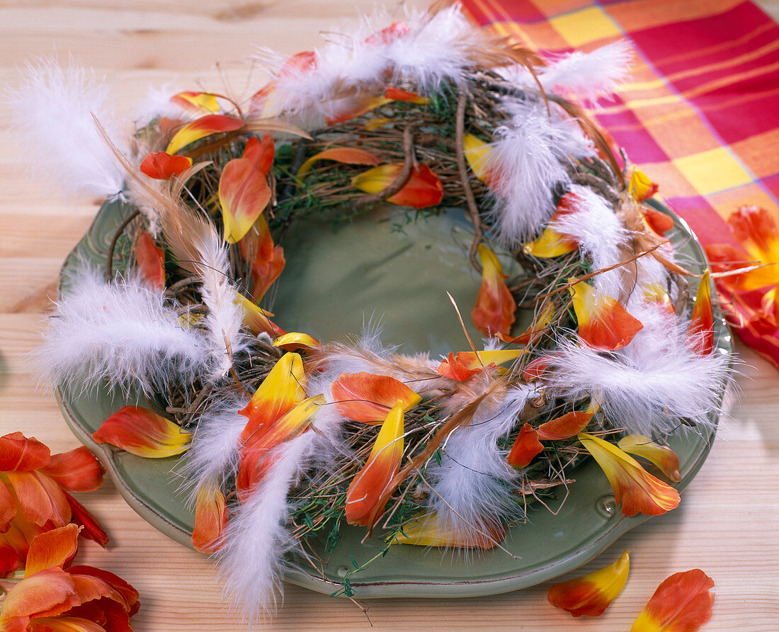 Wreath of twigs with feathers