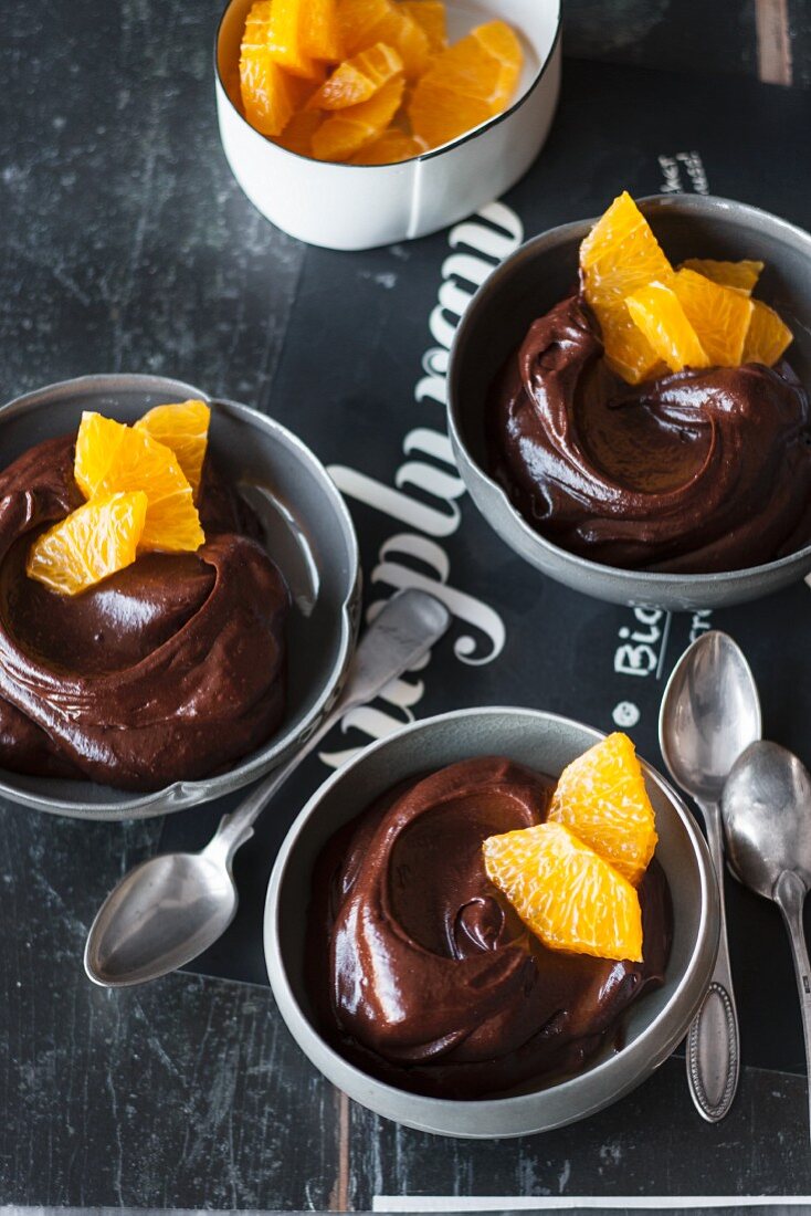 Vegan avocado chocolate mousse with orange segments